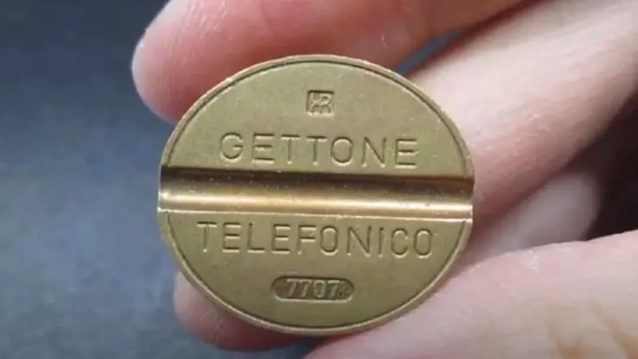 Você tem alguma ideia de quanto vale esse token de telefone antigo?  inesperado